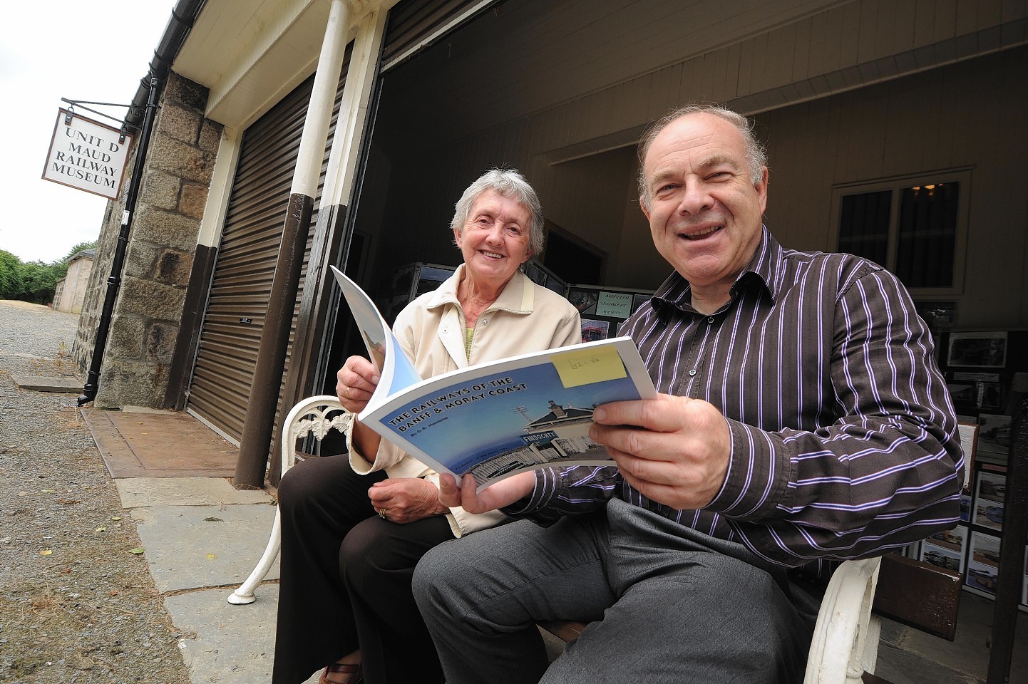 Railway museum volunteer Keith Jones with visitor Alice Duncan