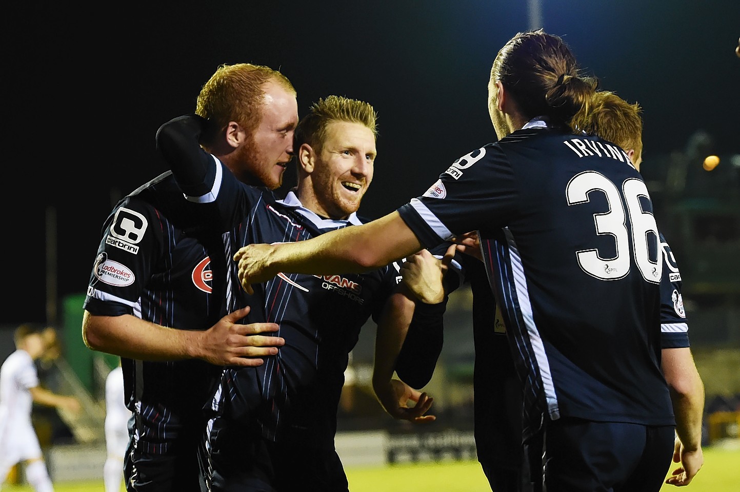 Michael Gardyne celebrates scoring Ross County's second in the Highland derby