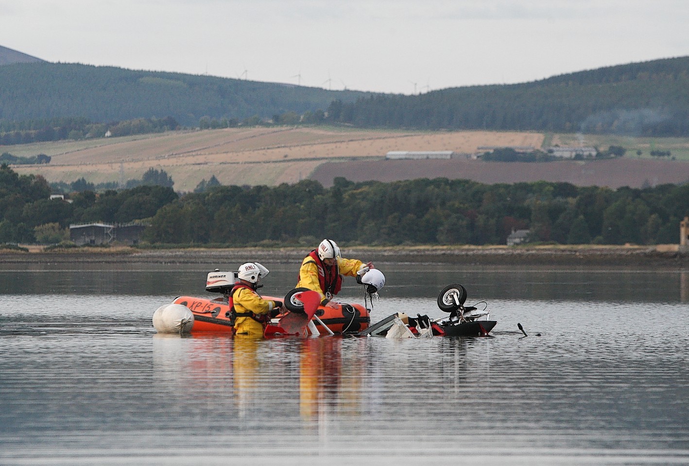The wreckage of the microlight slowly sinking into the Cromarty Firth