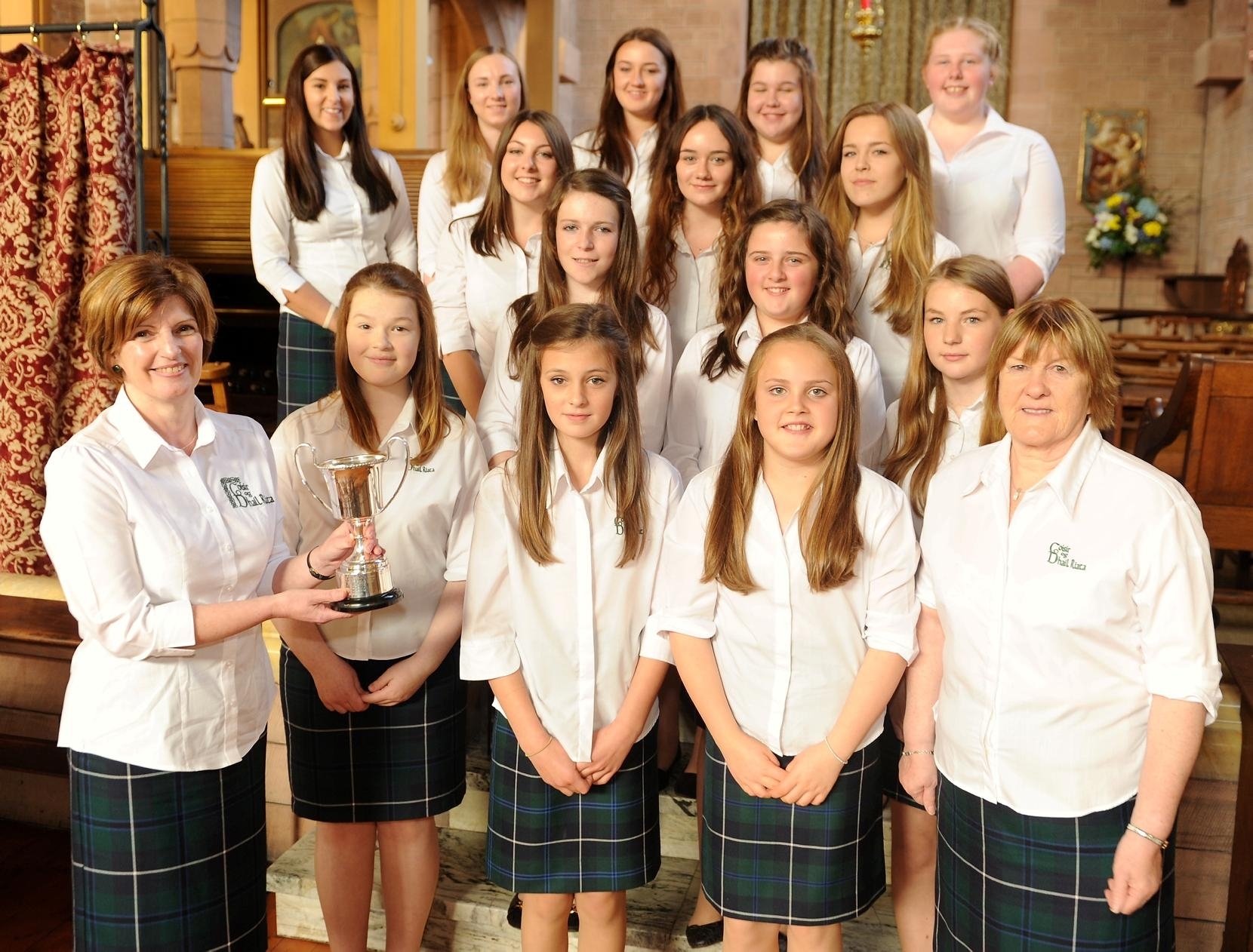 Picture by SANDY McCOOK   12th October '15 Royal National Mod, Oban 2015  Dalriada Gaelic Choir with the Martin Wilson, North Berwick Trophy for Choral singing. Holding the trophy is conductor Fiona Munro while on the right is Gaelic tutor Christine Johnstone.