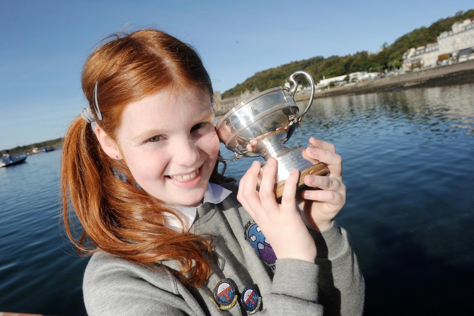 Picture by SANDY McCOOK   13th October '15 Royal National Mod Oban 2015 (Tuesday)  Laura Robertson of Lochaber Gaelic Primary School with the Nancy Craik Memorial Trophy in singing for fluent speakers.