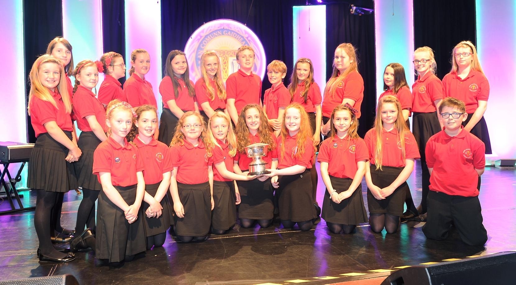Picture by SANDY McCOOK   12th October '15 Royal National Mod, Oban 2015  The Port Ellen Primary School Choir with the Susan Paterson Caledonian MacBrayne Trophy. One the left is David Cannon of Caledonian MacBrayne and on the right Maureen Macdonald, conductor.