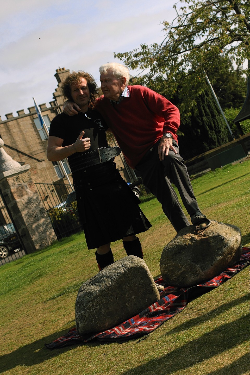 Stevie and Jack Shanks with the Dinnie Steens in Aboyne Green