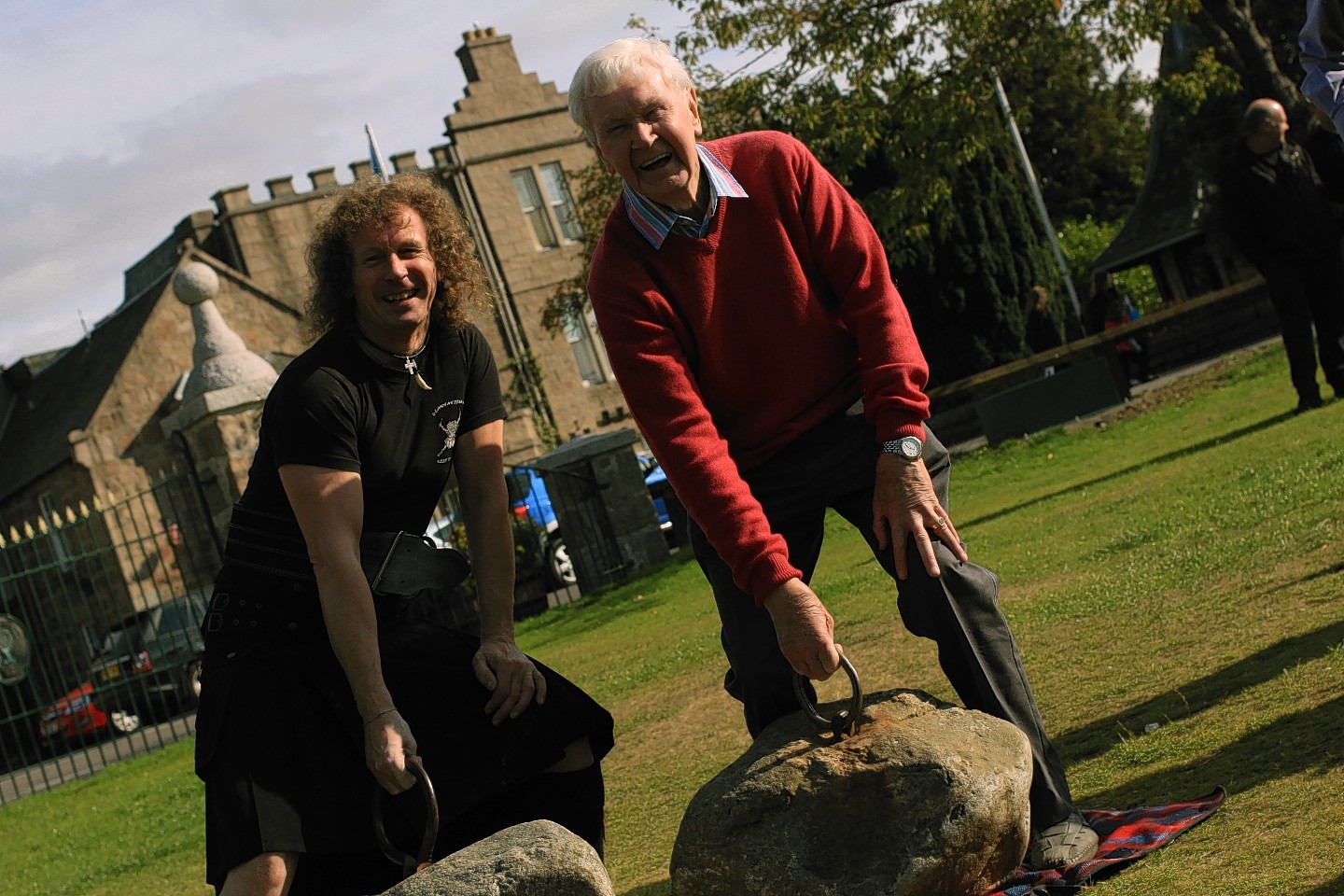 Stevie and Jack Shanks holding the Dinnie Steens