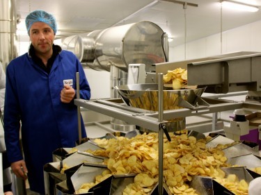 Tom Keogh in the crisps factory
