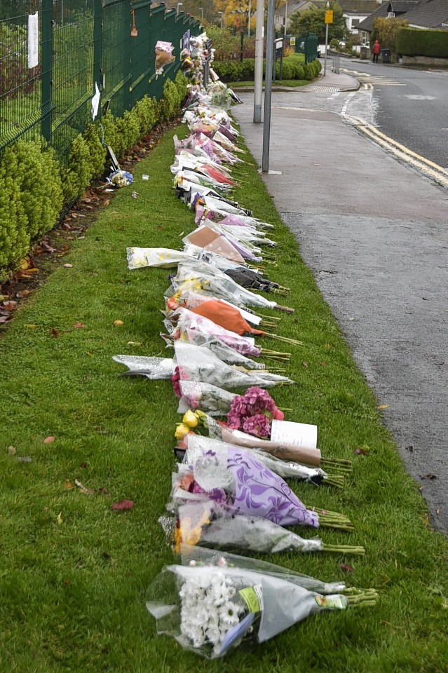 Floral tribute in memory of schoolboy Bailey Gwynne outside Cults Academy 