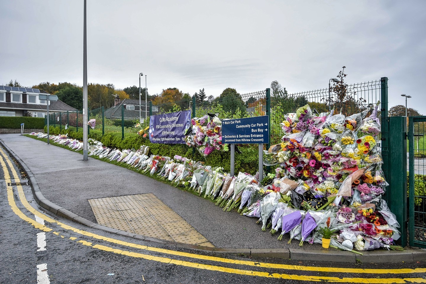 Hundreds of floral tributes were left outside the school 