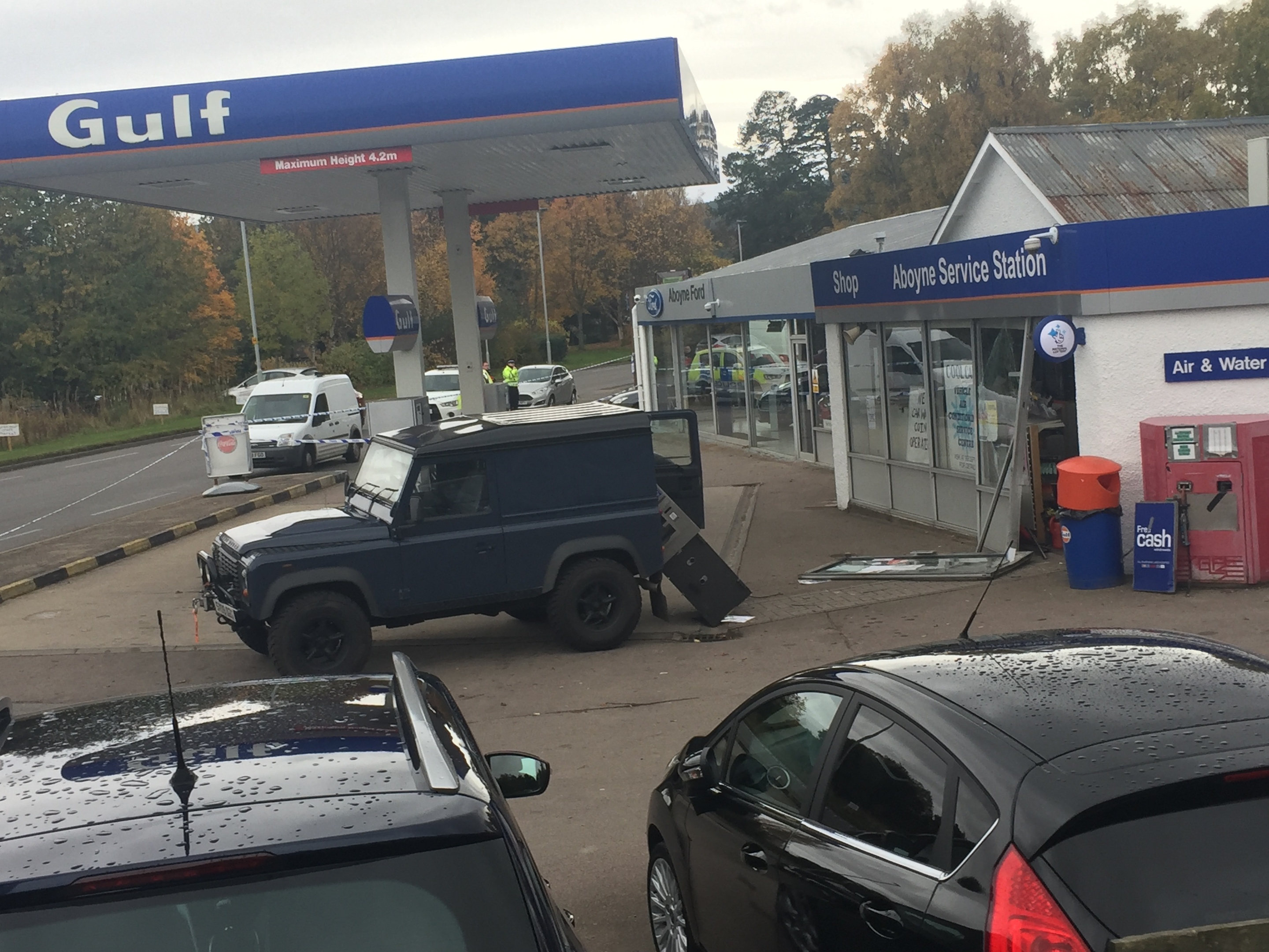 Police at the scene of the raid in Aboyne