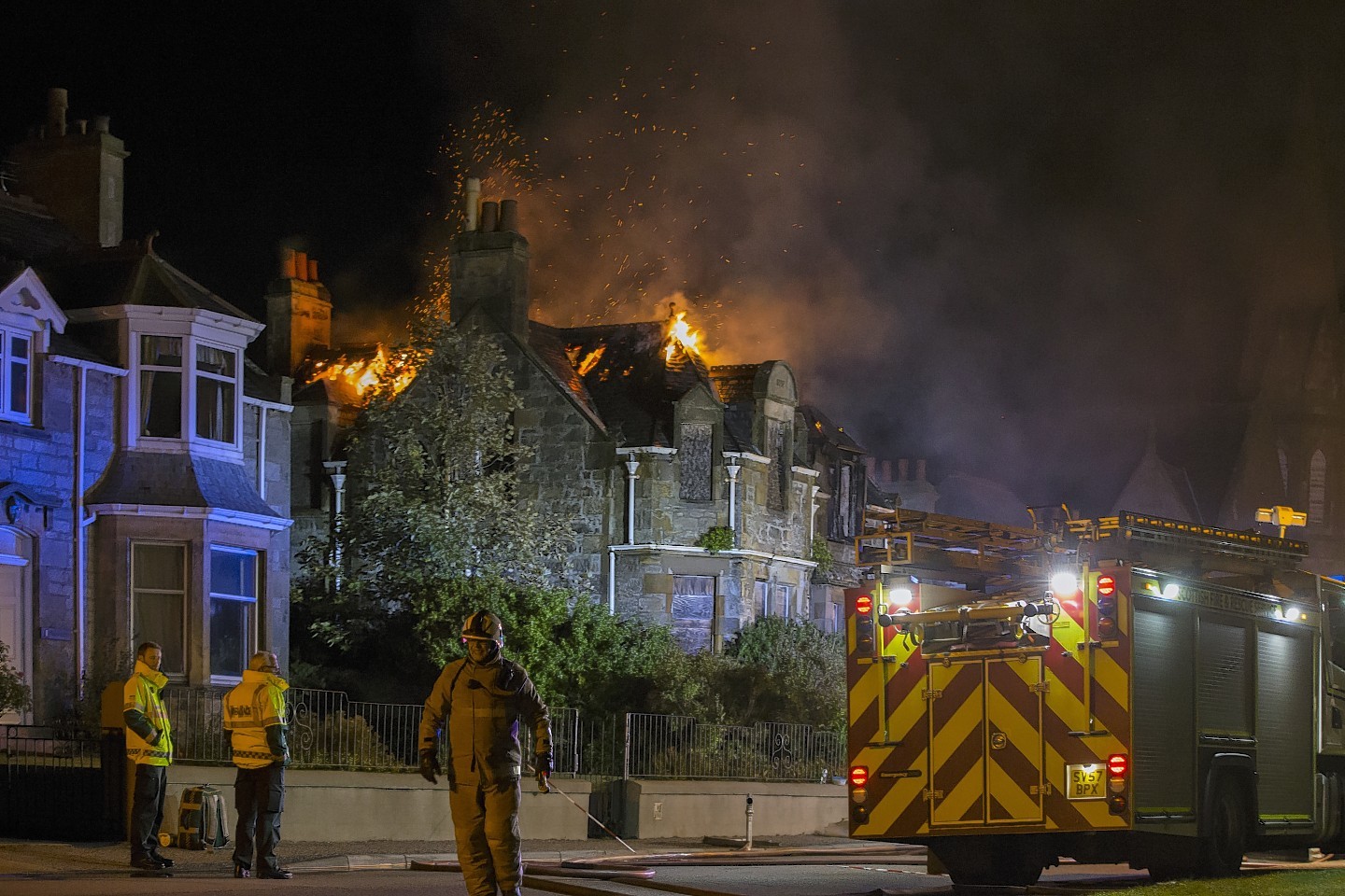 Firefighters are battling a "well-established" fire in Moray