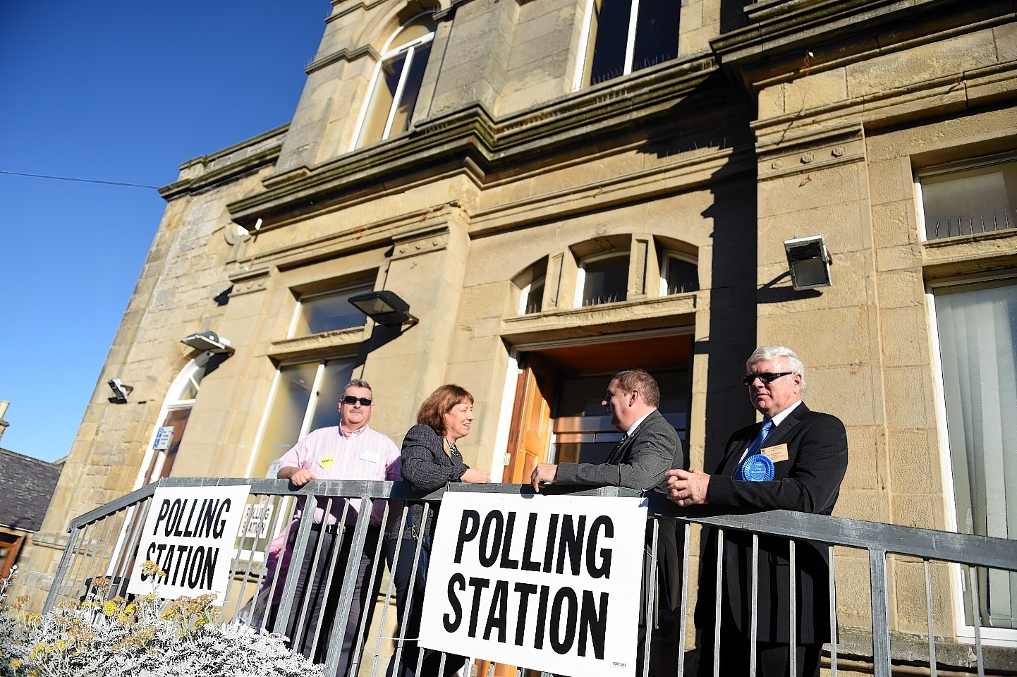 Agents and candidates outside the Polling Station at the Town Hall, Lossiemouth