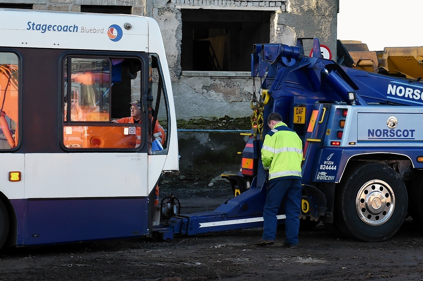 The bus involved in the crash this morning on the A90 sits at a garage nearby. Picture by Colin Rennie