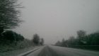 Snow falling on the A90