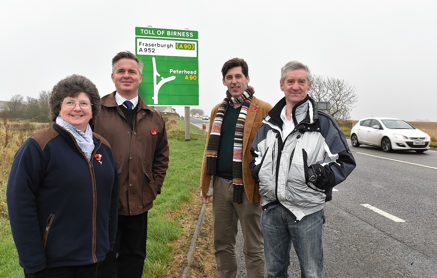 (from left) Cllr Gillian Owen (Ellon and District), Colin Clark, Scottish Conservative Candidate for Aberdeenshire East, Ian Duncan, Conservative MEP for Scotland and Peter Chapman MSP Conservative Candidate  at the Toll of Birness junction where they launched a funding proposal to dual the A90 as far as Ellon.
Picture by COLIN RENNIE    November 5, 2015.