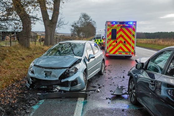 Road authorities agree to review signage and markings on A96 amid safety concerns from villagers. Scene of the crash on the A96 near Brodie. Picture by Jasperimage