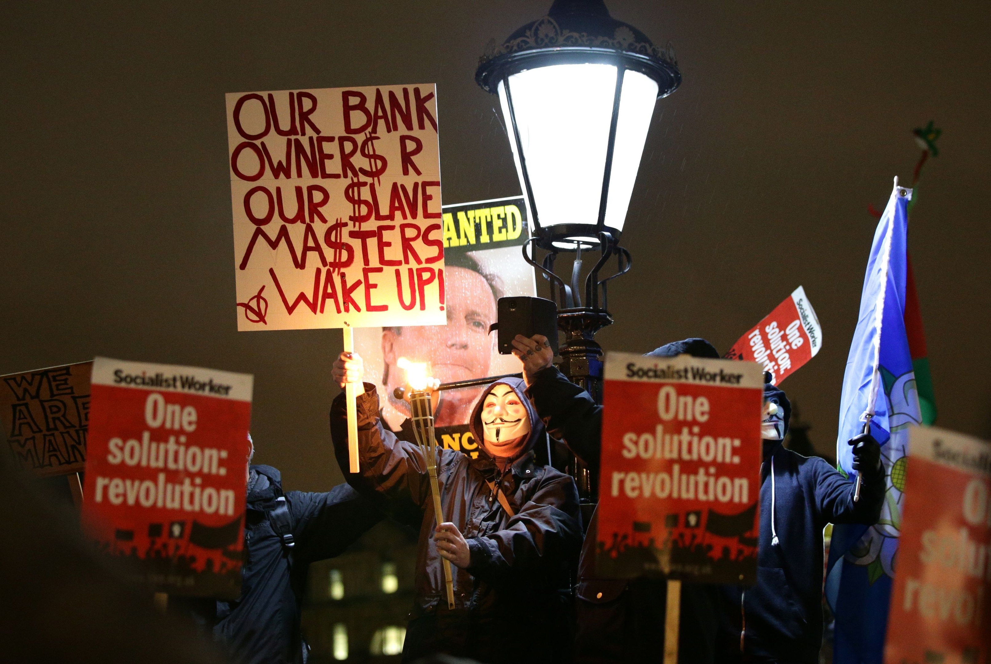 Protestors demonstrate in Trafalgar Square, London, 