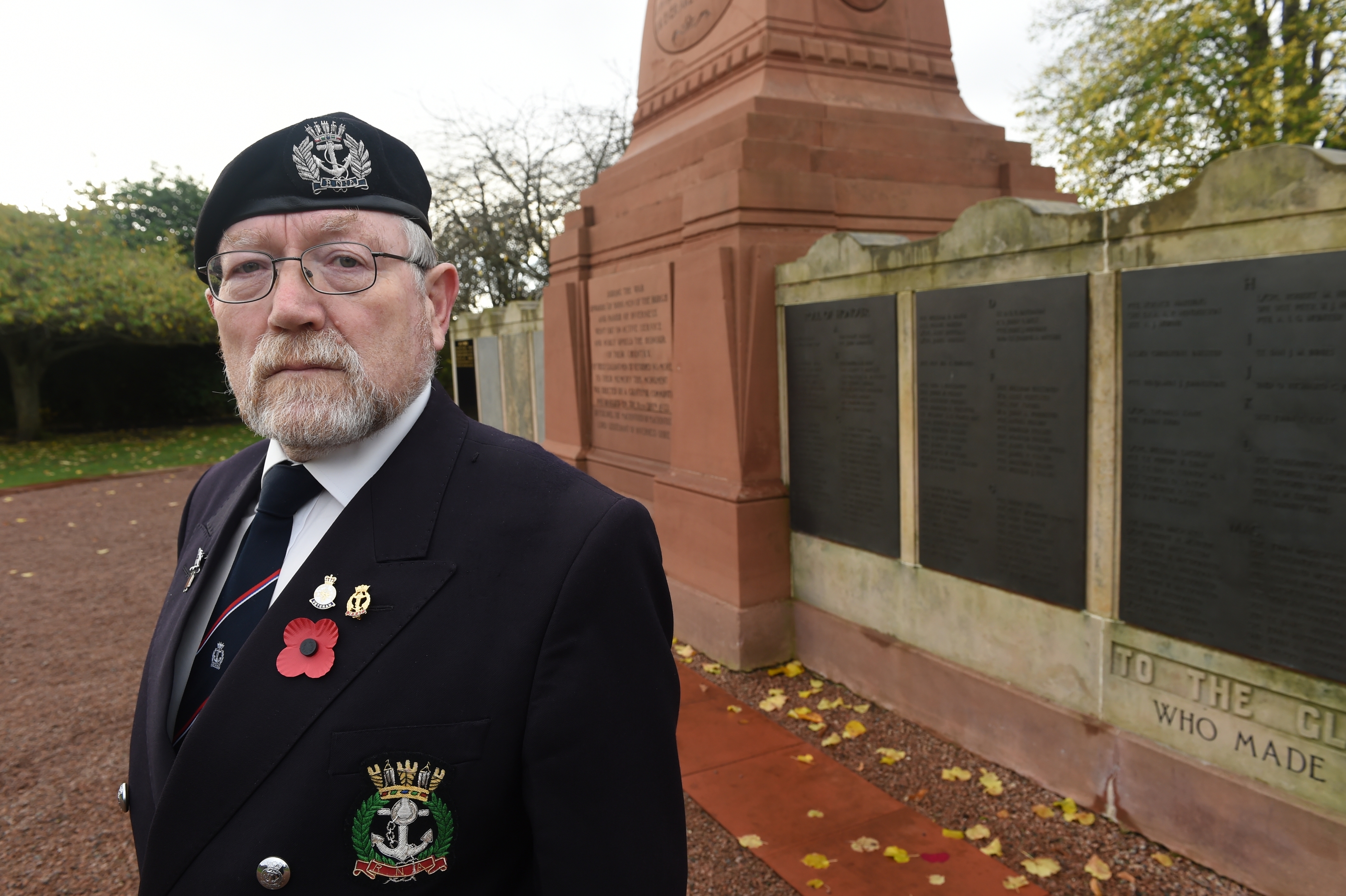The Cenotaph in Cavell Gardens, Inverness at 11am yesterday as members of the public and ex servicemen have their own moments of remembrance . Robert Coburn of the City of Inverness Royal Naval Association who laid a wreath.