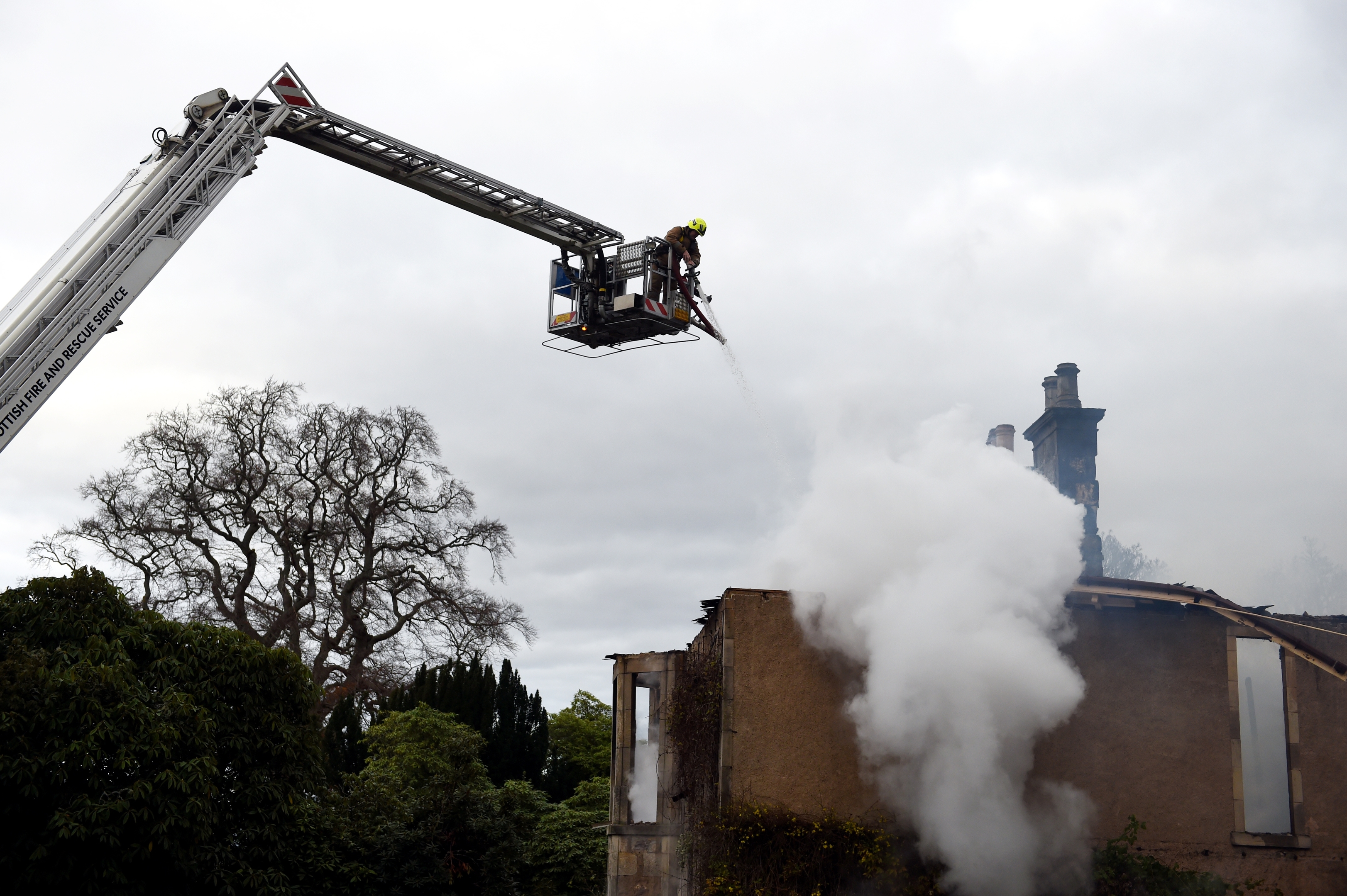 Blackhills House, near Elgin, being damped down by firefighters 