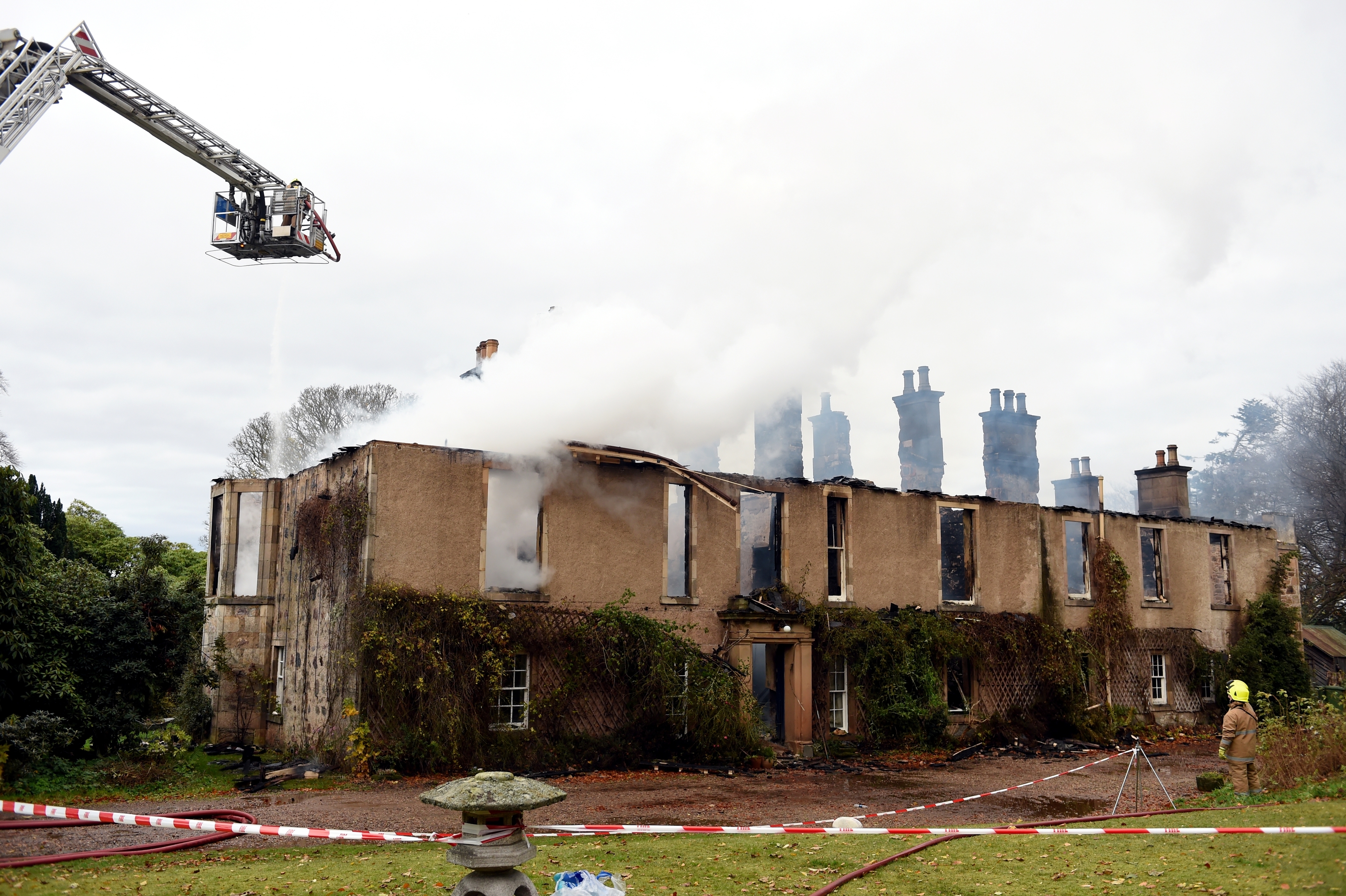 Blackhills House, near Elgin, being damped down by firefighters following a major fire in the early hours of Thursday morning. Picture by Gordon Lennox 26/11/2015