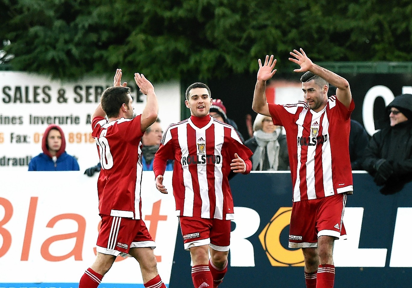 Formartine's Cammy Keith celebates with team-mates after scoring in the first half