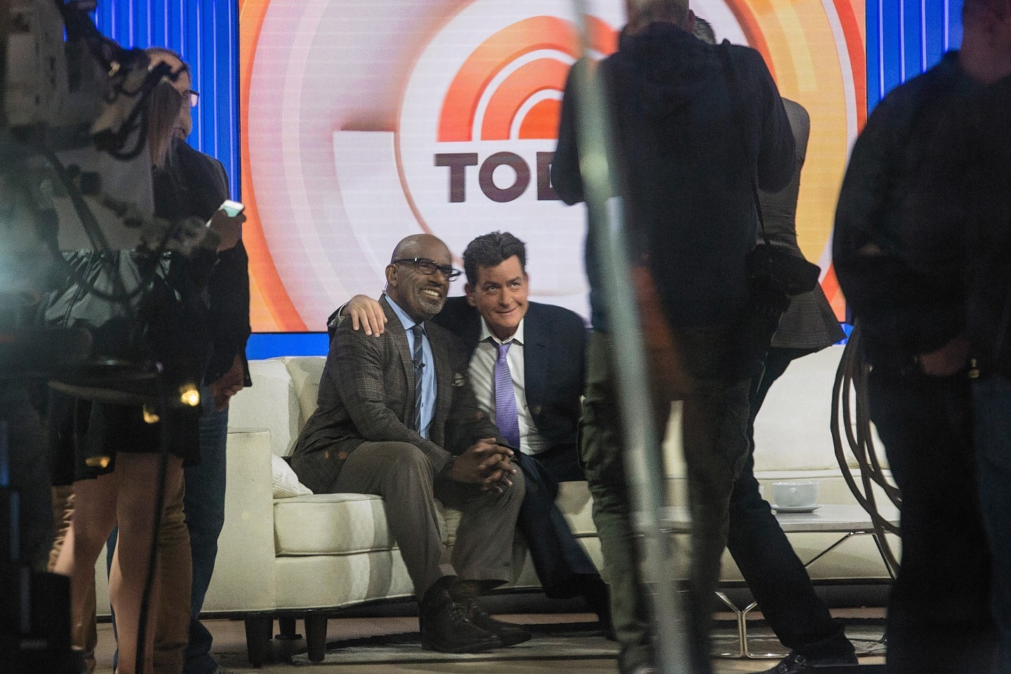 Charlie Sheen has his photo taken with Al Roker on the set of the Today Show before formally announcing that he is H.I.V. positive 