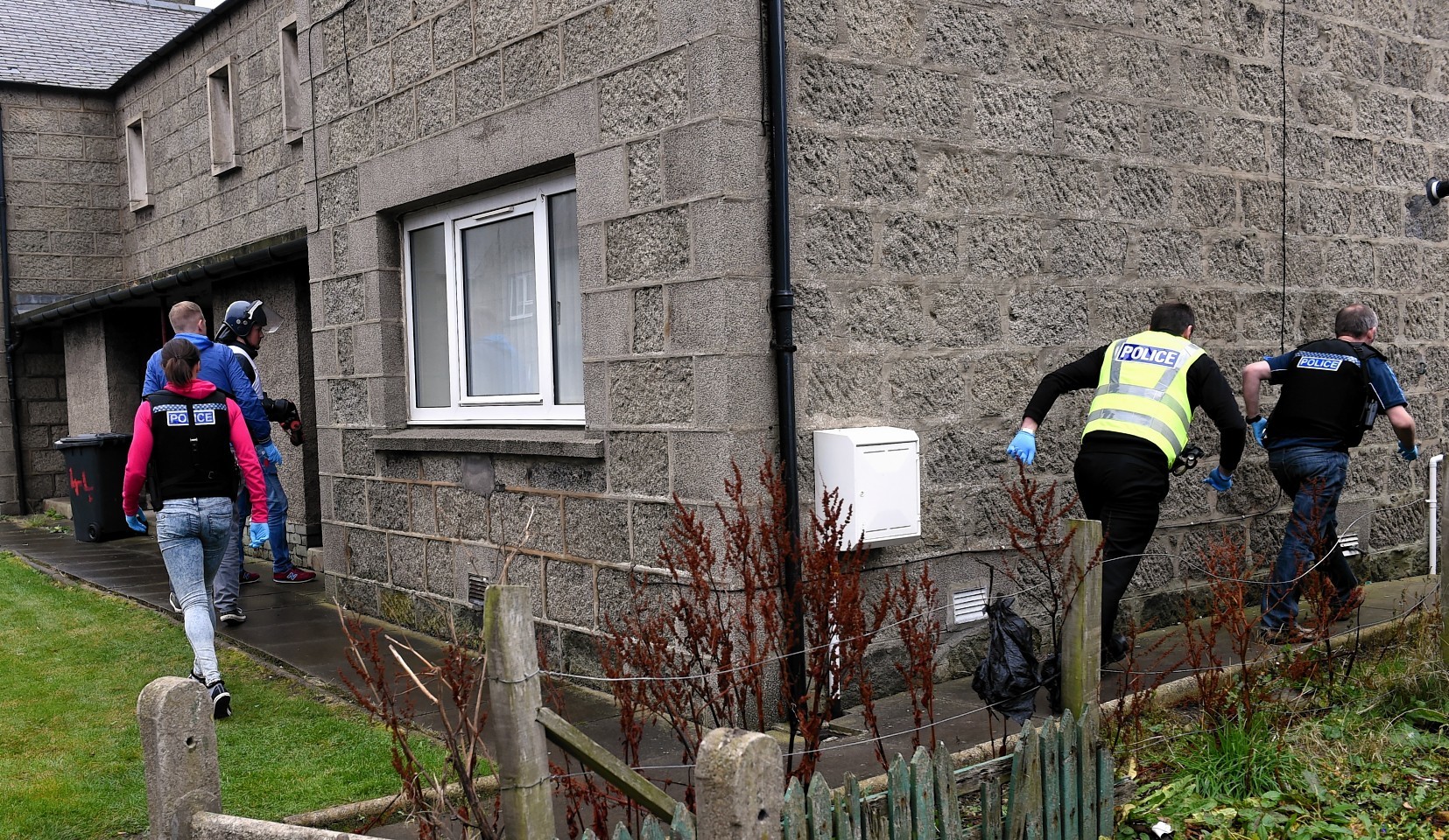 Police start a raid on a home in Fraserburgh
