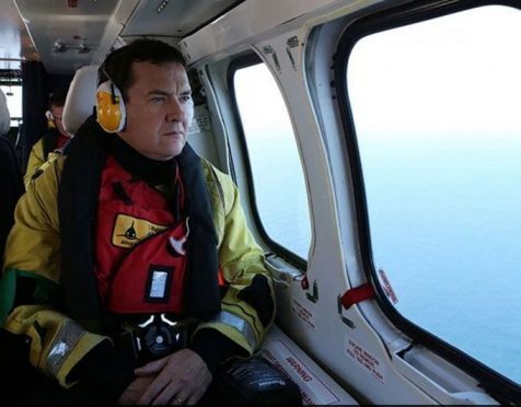 George Osborne flies over the North Sea on board a Super Puma