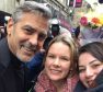 George Clooney takes a selfie with fans Malin Wilje and Merita Selmani as he arrived at Social Bite in Edinburgh.