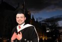 Jack Grigor, from Forres, collects his degree. Picture by Jim Irvine