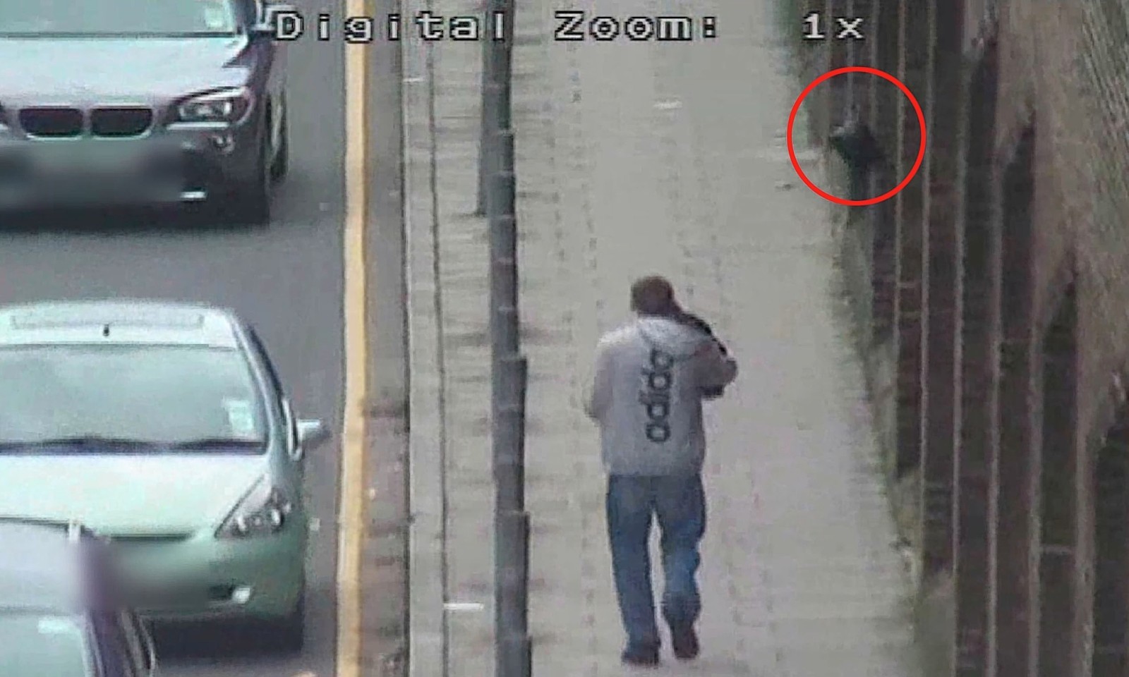 The CCTV footage showing Karl Jensen using a fishing line to smuggle banned goods
