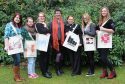 Textile students with their tote bags inspired by Drum Castle