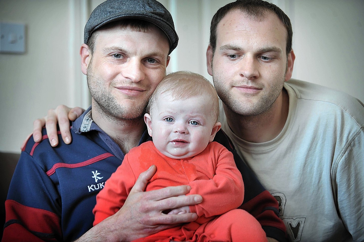 Ceri Lesley with his daughter and his brother on the right Nevan McFetrich.