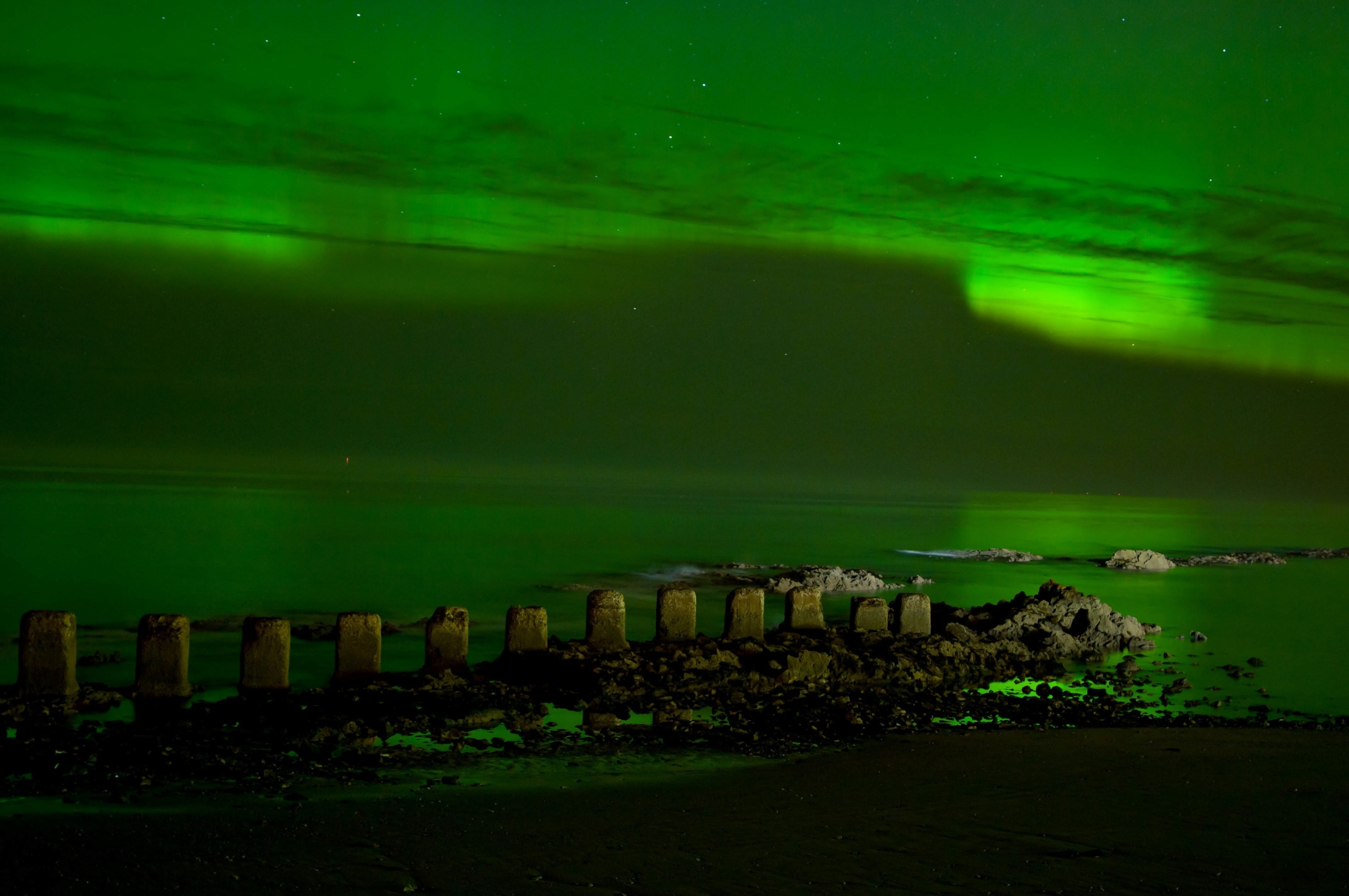 Stunning green Aurora seen at Lossiemouth West Beach