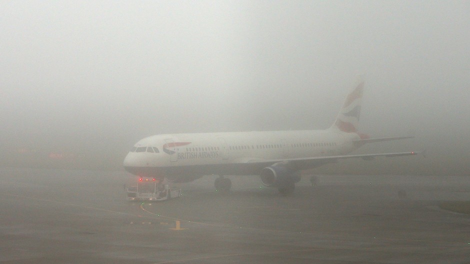 A British Airways plane in foggy conditions