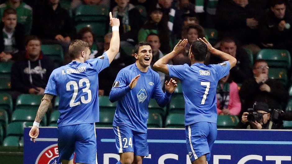 Molde's Mohamed Elyounoussi, centre, celebrates scoring his side's first goal against Celtic during Thursday night's match