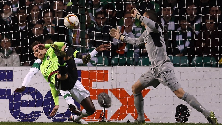 Ajax's Arkadiusz Milik scores his sides first goal during the UEFA Europa League match at Celtic Park