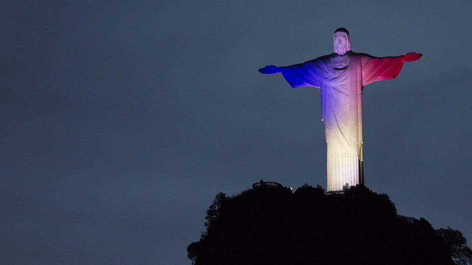 Christ the Redeemer statue is lit with the colours of France's flag (AP)