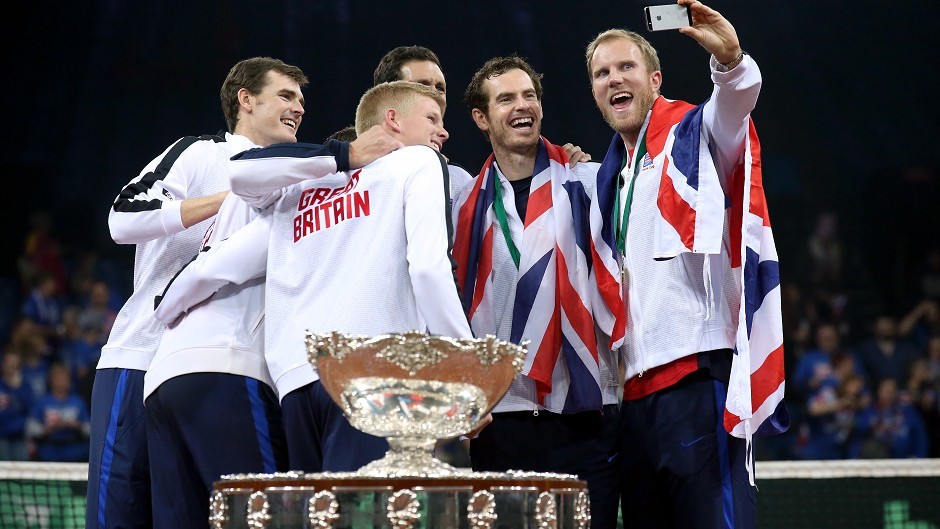Great Britain's Dominic Inglot takes a selfie of his team-mates including Kyle Edmund, third from right, Andy Murray, second from right, and Jamie Murray, left