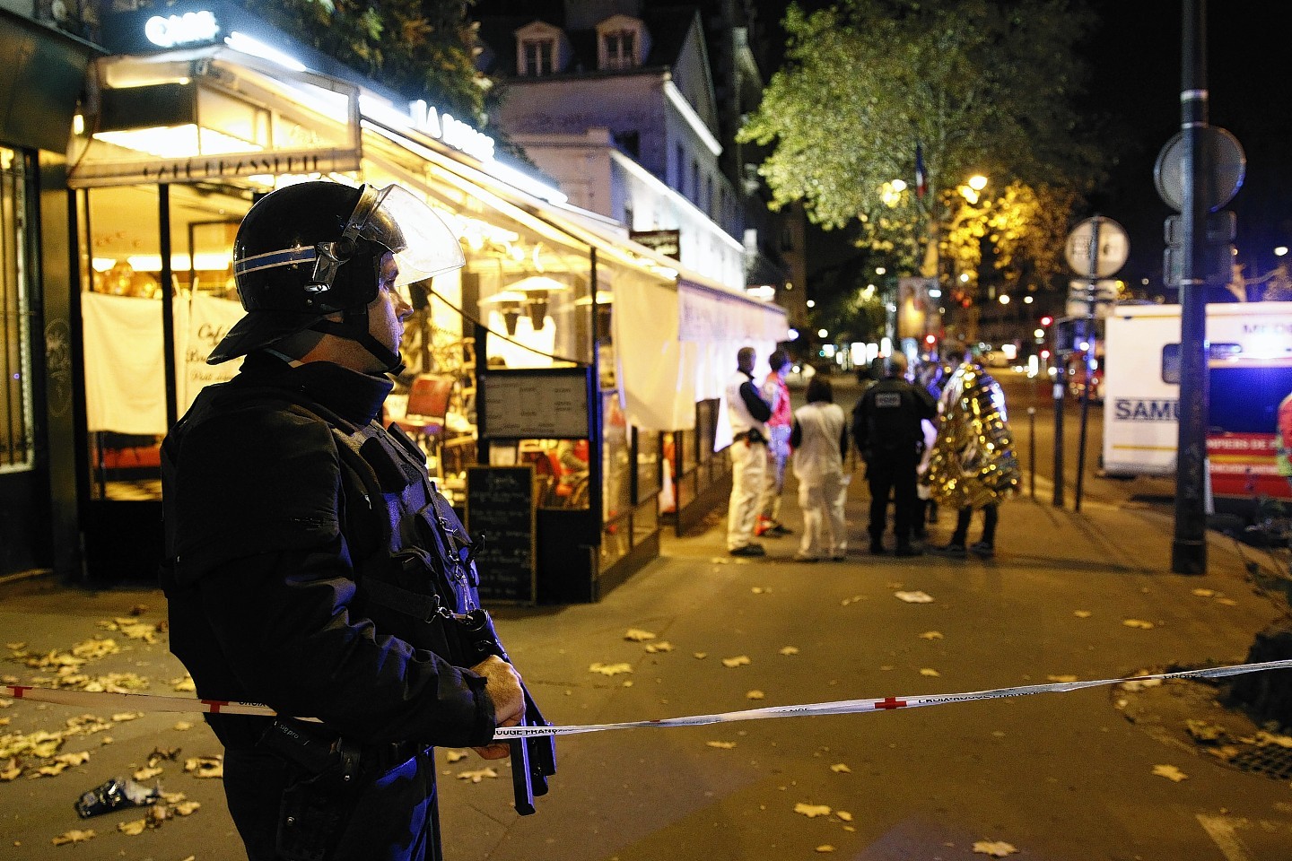 A policeman stands guard near the Boulevard des Filles-du-Calvaire 