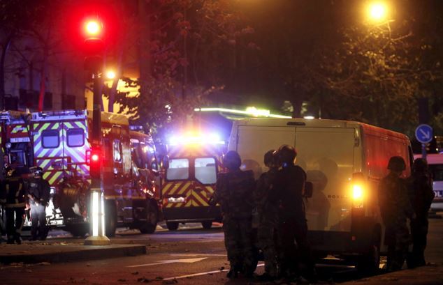 Police near one of the shootings in Paris 