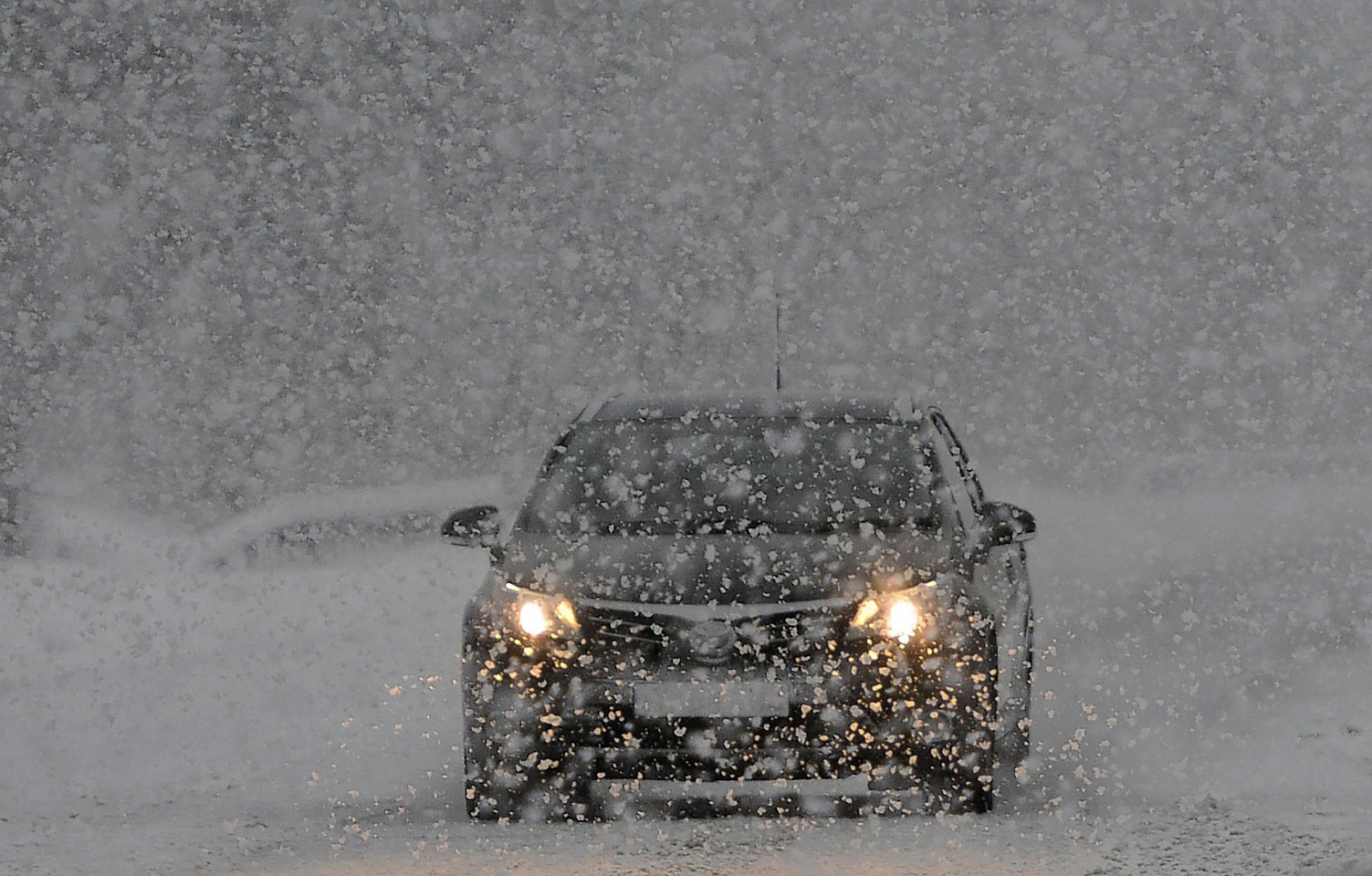 An Aberdeenshire councillor has called for rural communities to help keep some of the region's most remote roads clear as £1m of council cutbacks take hold.