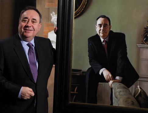Former First Minister Alex Salmond MP unveils a portrait of himself by Gerard Burns, at the National Galleries of Scotland