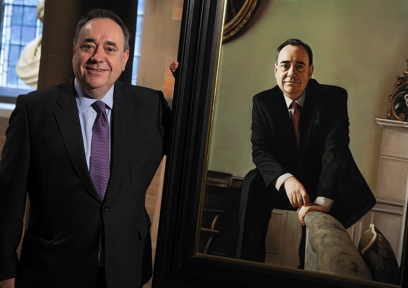 Former First Minister Alex Salmond MP unveils a portrait of himself by Gerard Burns, at the National Galleries of Scotland
