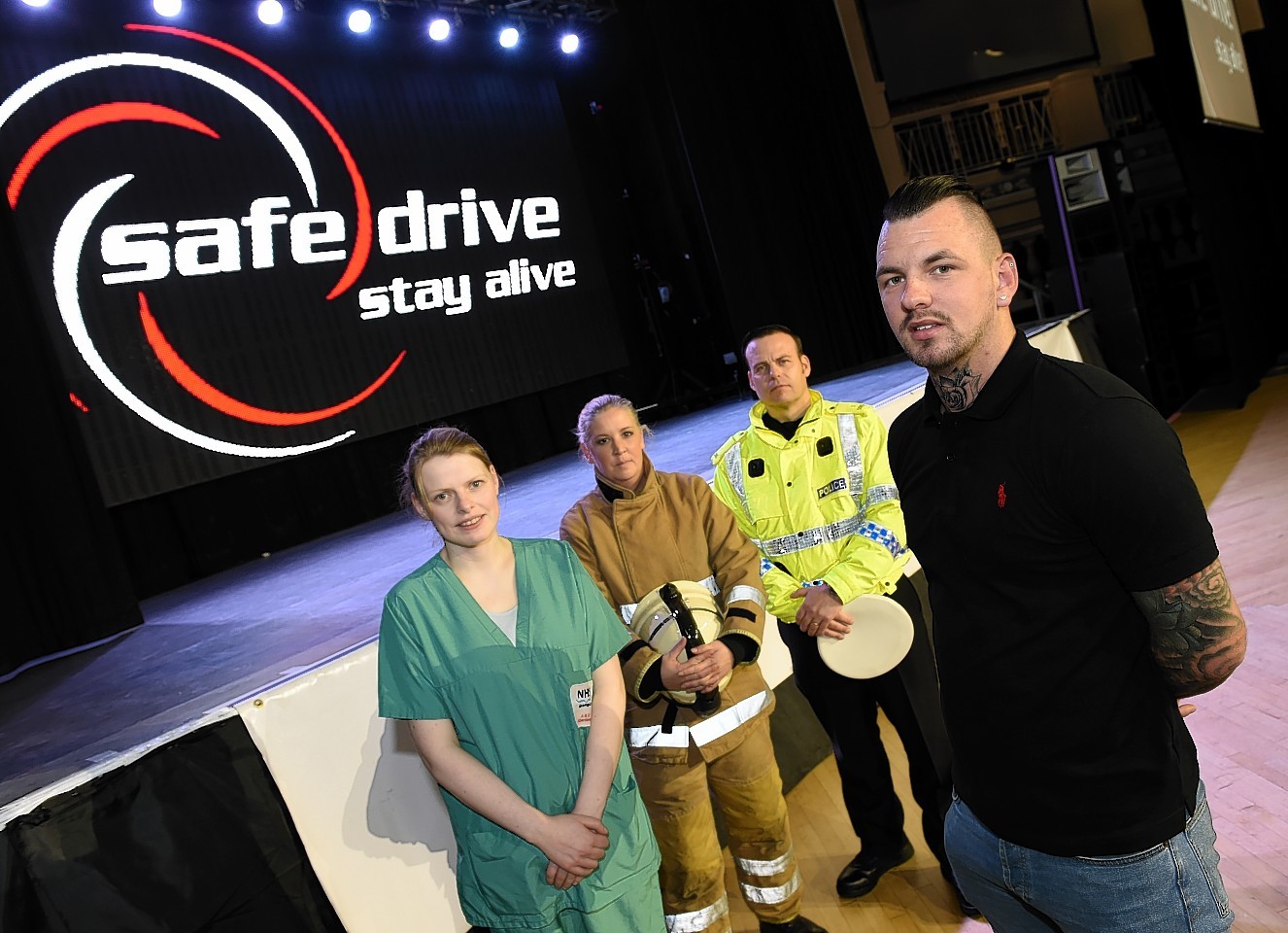 Dr June Whiteford, NHS Grampian, Lillian Shanks, Scottish Fire and Rescue Service, PC William Wallace, Scottish Police Force and ex Elgin City footballer Chris Tucker taking part in Safe Drive Stay Alive road safety show at the Beach Ballroom