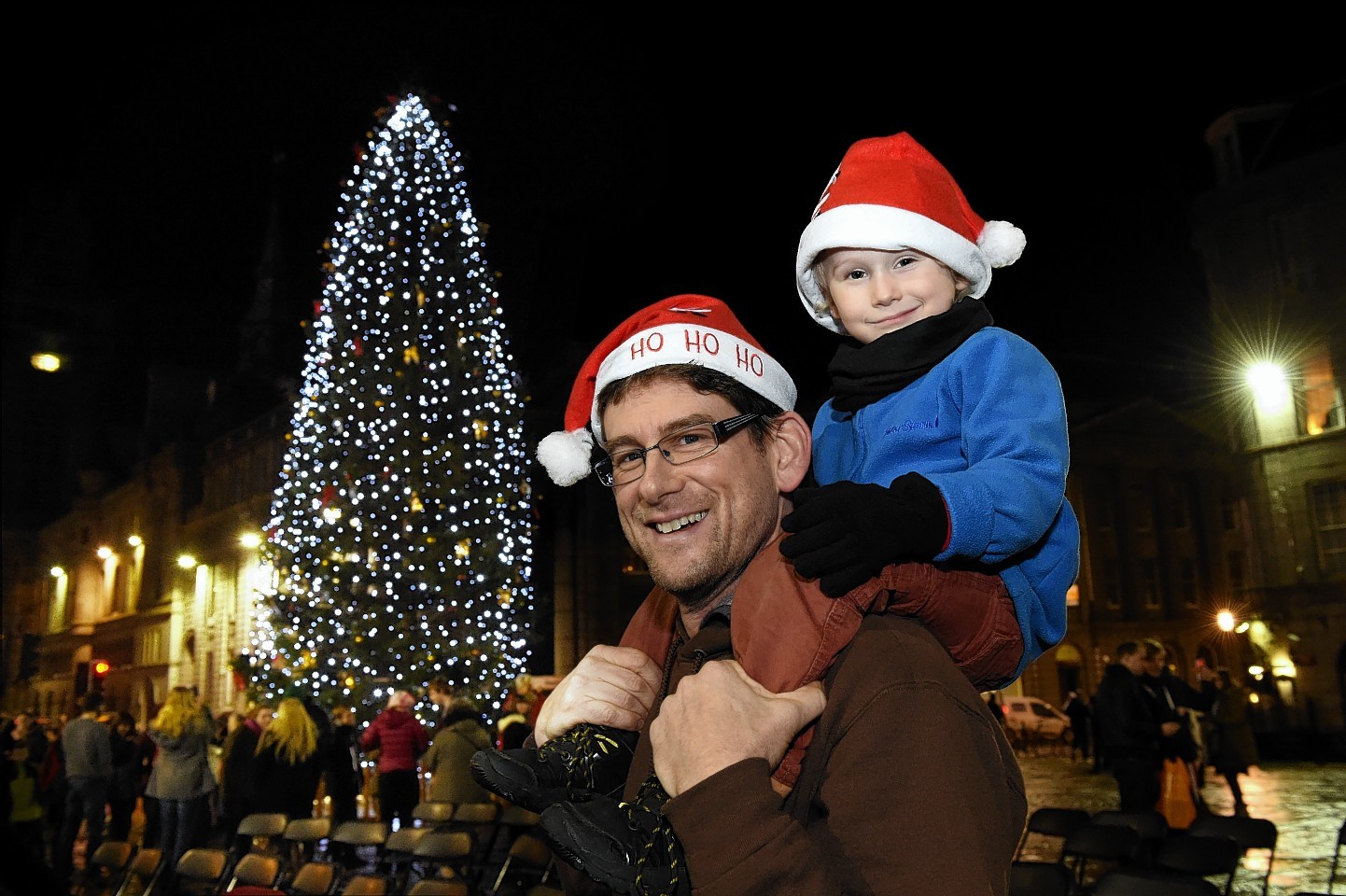 James Myers with his son Sam at the lighting up ceremony of Aberdeen's Christmas tree at Castlegate.