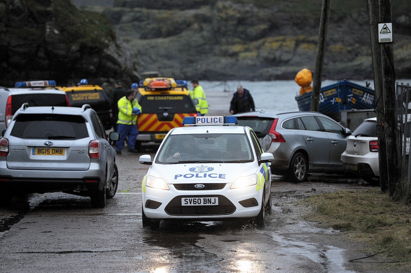 Emergency services at Cove Bay where the climber was rescued