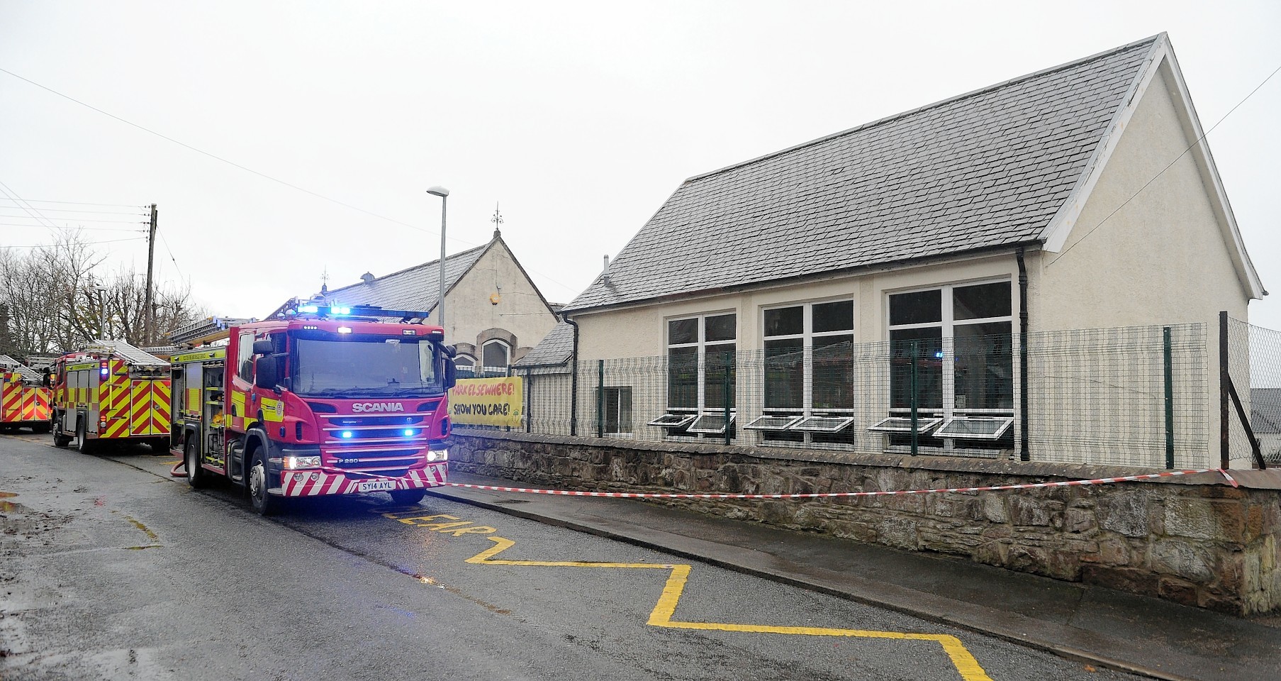 Firefighters at the scene of the classroom fire at Balloch Primary School