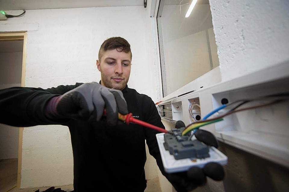 Gateway Controls Systems apprentice electrician Joel Reid working at  Glen Moray Distillery in Elgin.