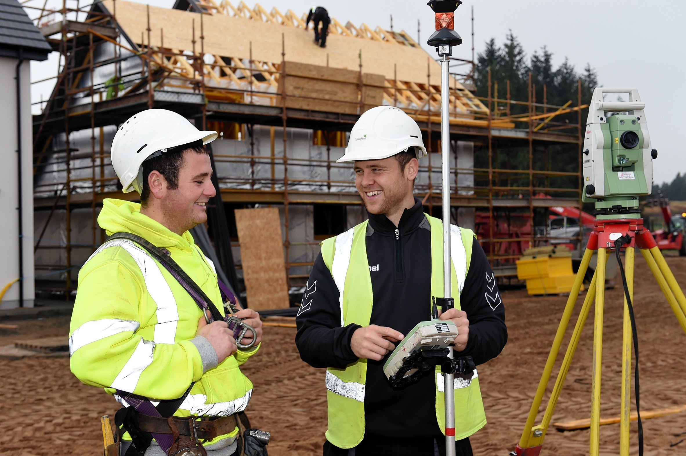 Springfield apprentice scaffolder, Conn Hysert, left, with civil engineer apprentice, Simon Allan, right,  on site at Duncansfield Estate, Elgin.