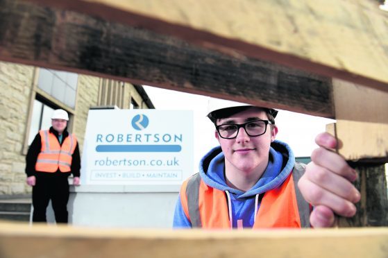 Apprentice joiner Cameron McLeod at Robertson Group, and Steve Anderson (site manager) was an apprentice 25 years ago.