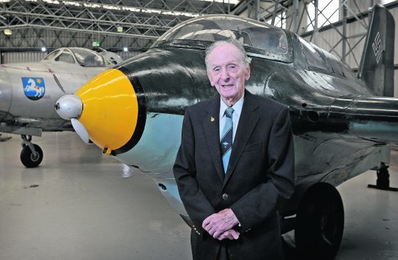 Captain Brown with the Messerschmitt Me 163B-1a Komet at the National Museum of Flight. PICTURE COURTESY OF NEIL HANNA